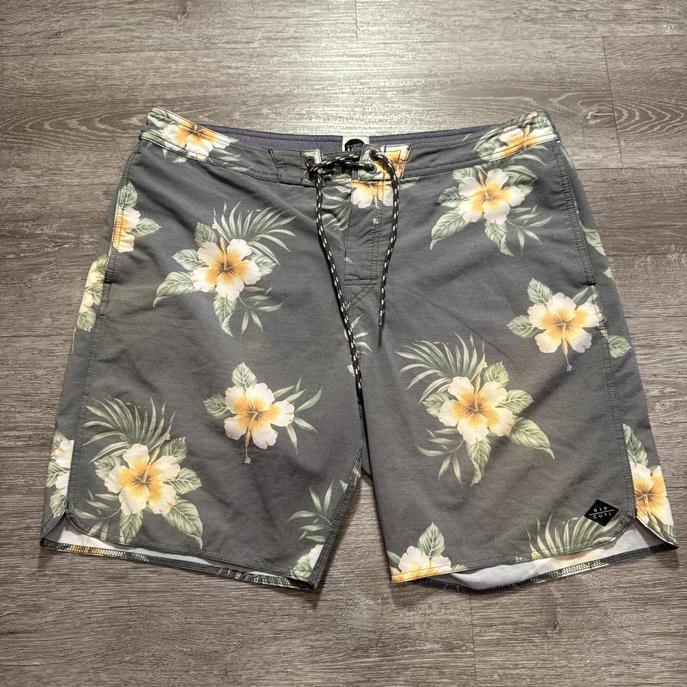 Rip Curl Gray Board Shorts with Yellow Floral Print and Green Leaves